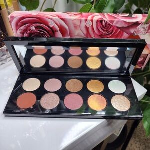 Pat McGrath Eyeshadow Palette with Gold, Pink, and Orange Hues